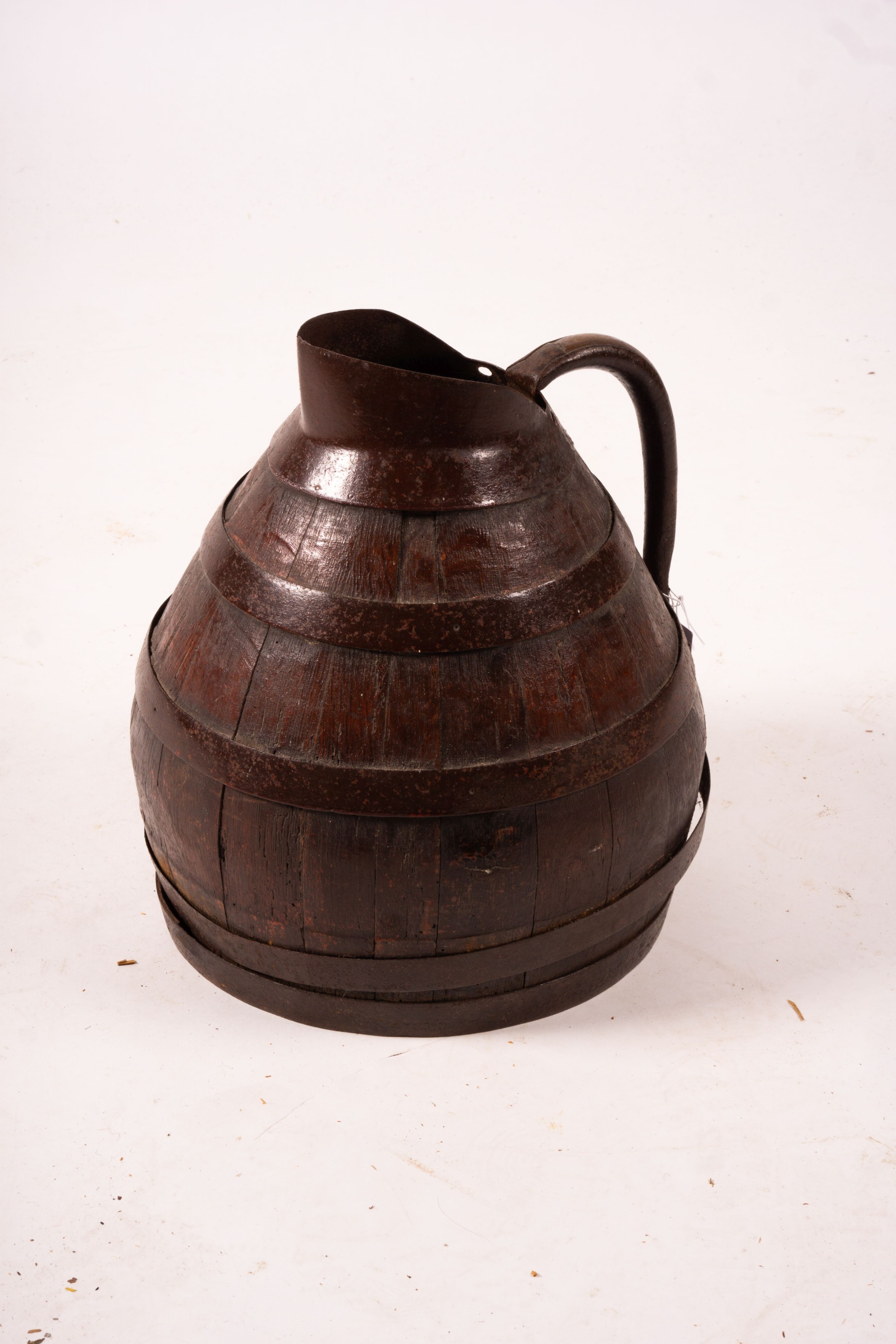 A Victorian iron bound staved oak jug, height 36cm, an amphora style pottery vase and a copper warming pan